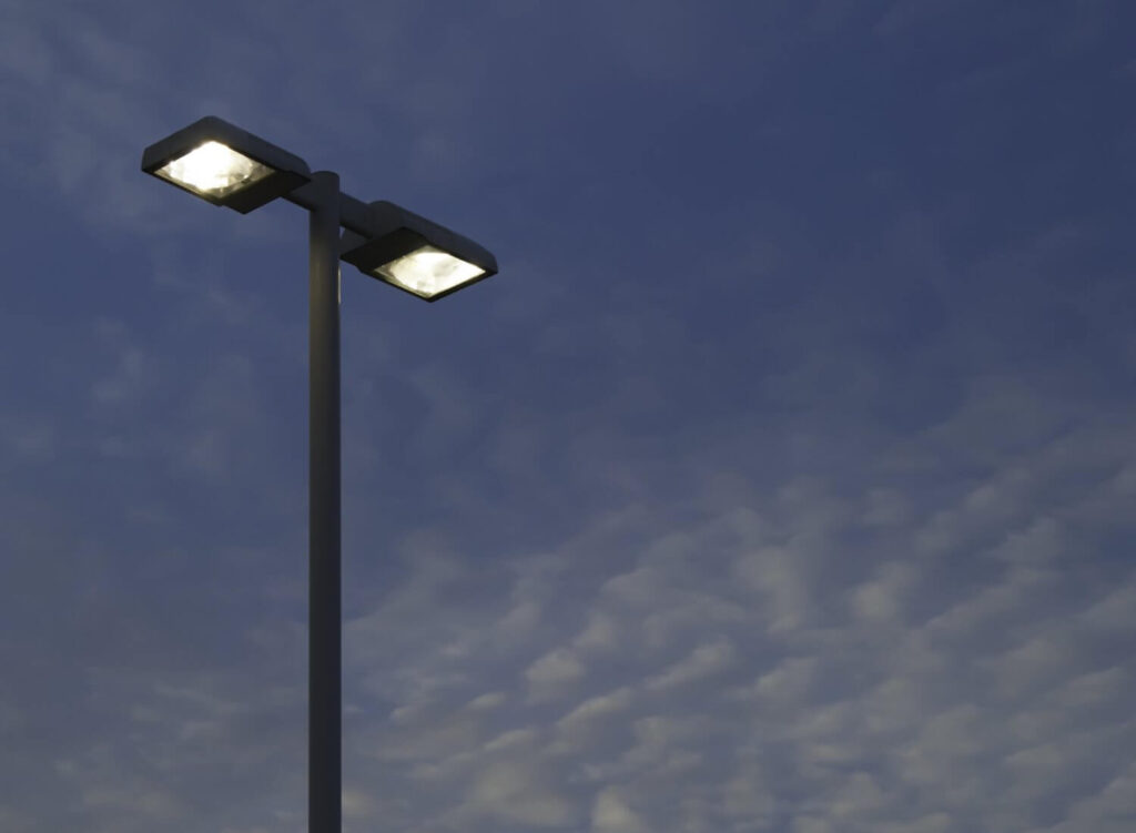 Two high parking lot lights